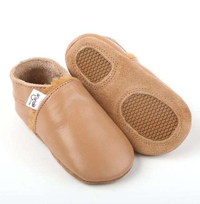 Ergonomic winter moccasins for first steps, brown suede with soft interior, non-slip sole.