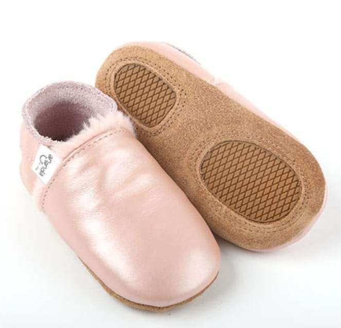 Rose ergonomic winter mocs for baby's first steps with anti-slip soles.