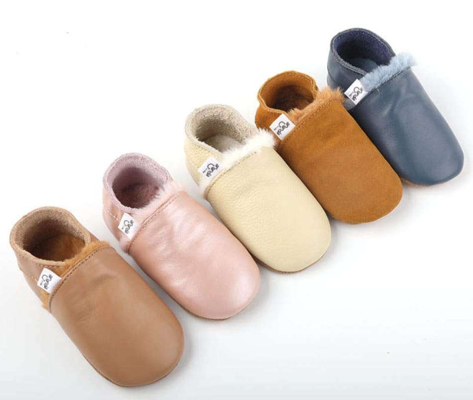 Ergonomic winter moccs for first steps in various colors, featuring soft interior and anti-slip soles.