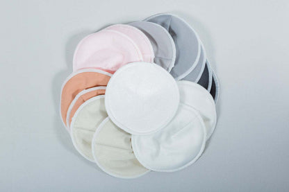 Absorbentes de leche reutilizables en varios colores, suaves y ultra absorbentes para lactancia.