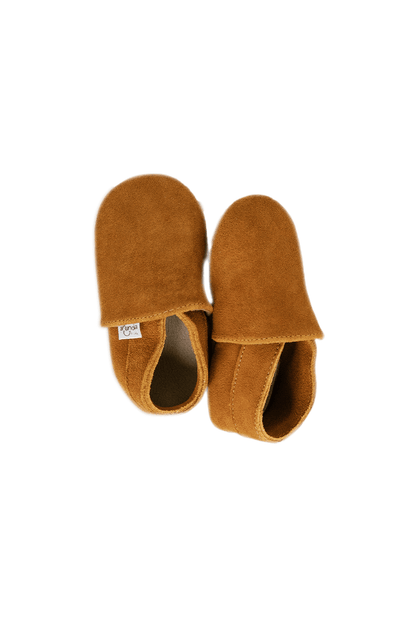 Ergonomic caramel moc baby shoes with natural stride and minimalistic design.