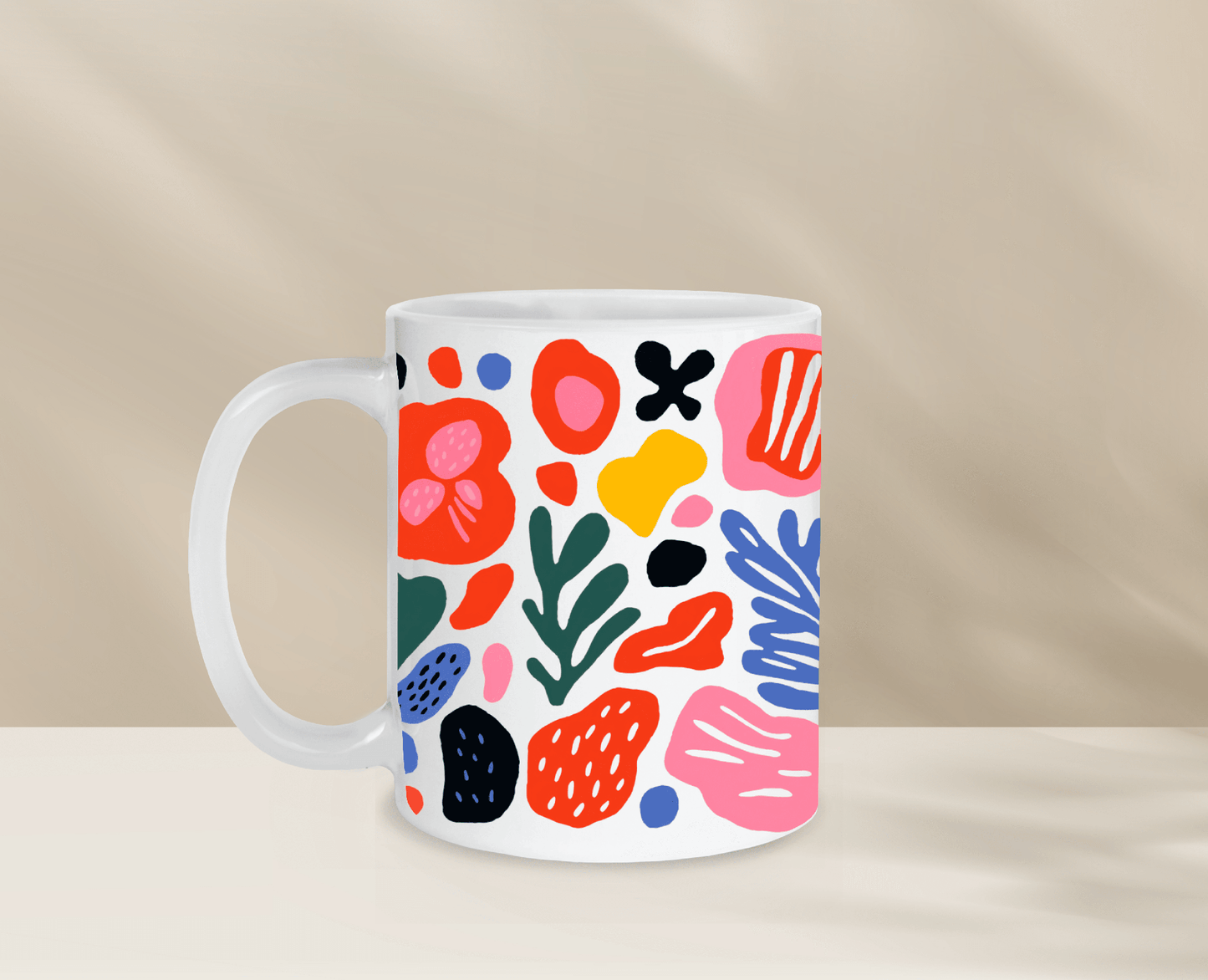 Colorful abstract design ceramic mug, perfect for morning coffee.