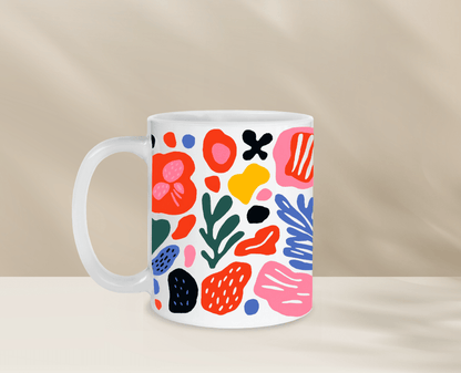 Colorful abstract design ceramic mug, perfect for morning coffee.