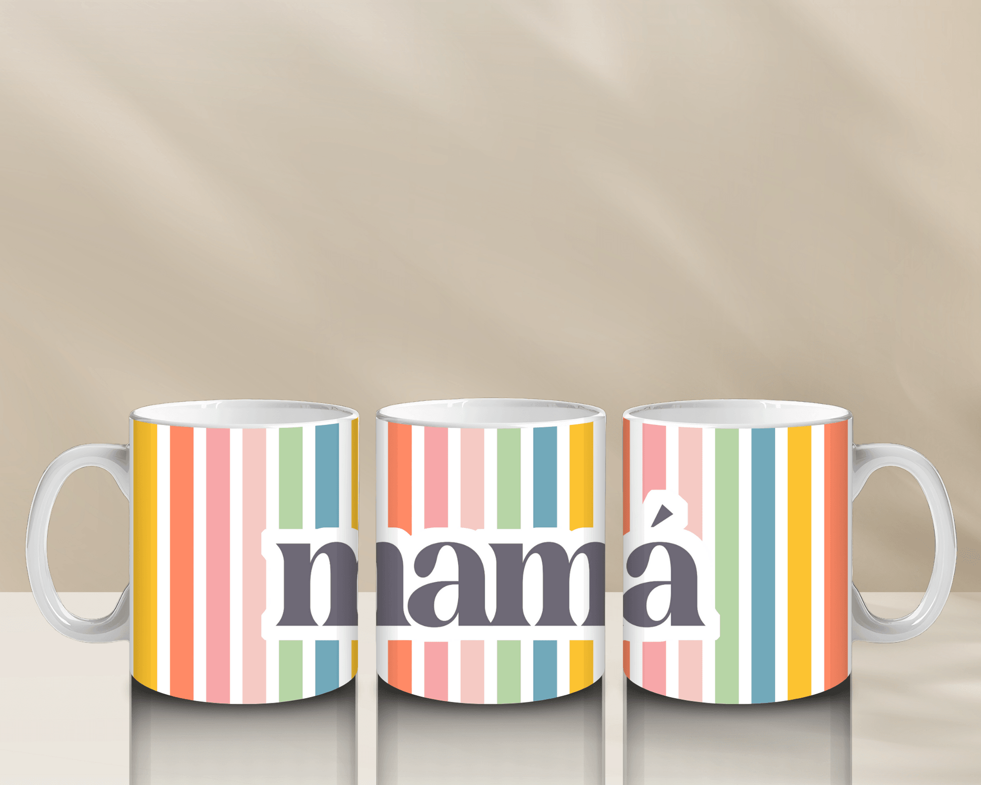 Colorful striped coffee mugs with "mamá" design.