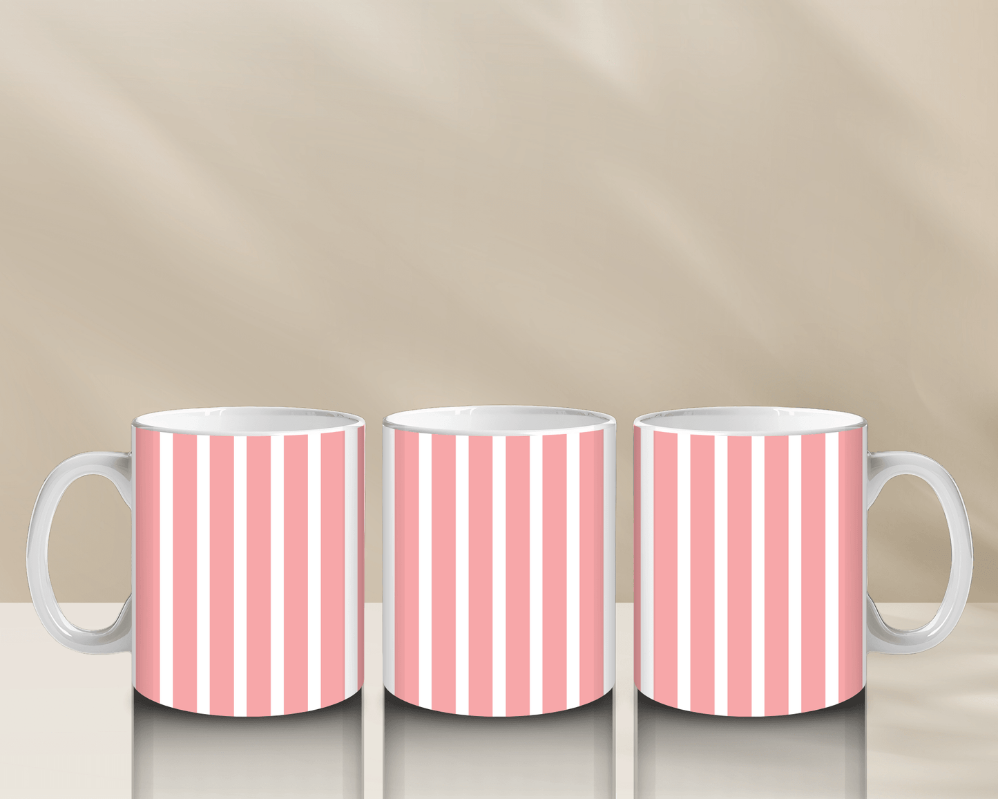 Striped pink and white coffee mugs in modern design.