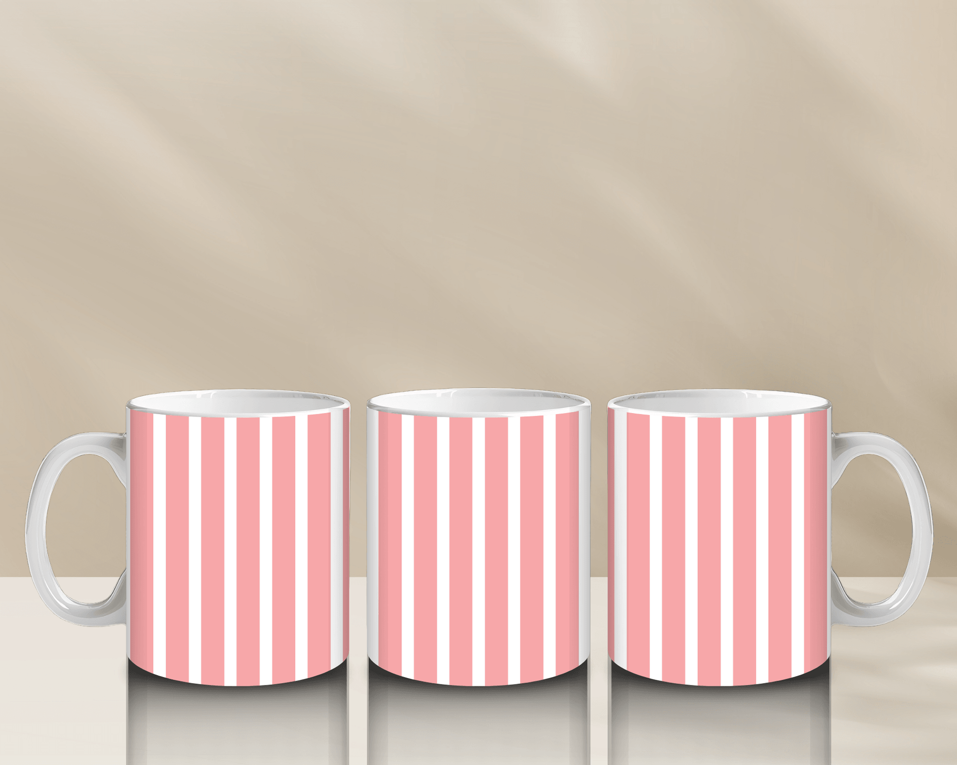 Striped pink and white coffee mugs in modern design.