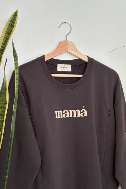 Dark gray nursing sweatshirt with "mamá" flock print, featuring side zippers for easy breastfeeding.