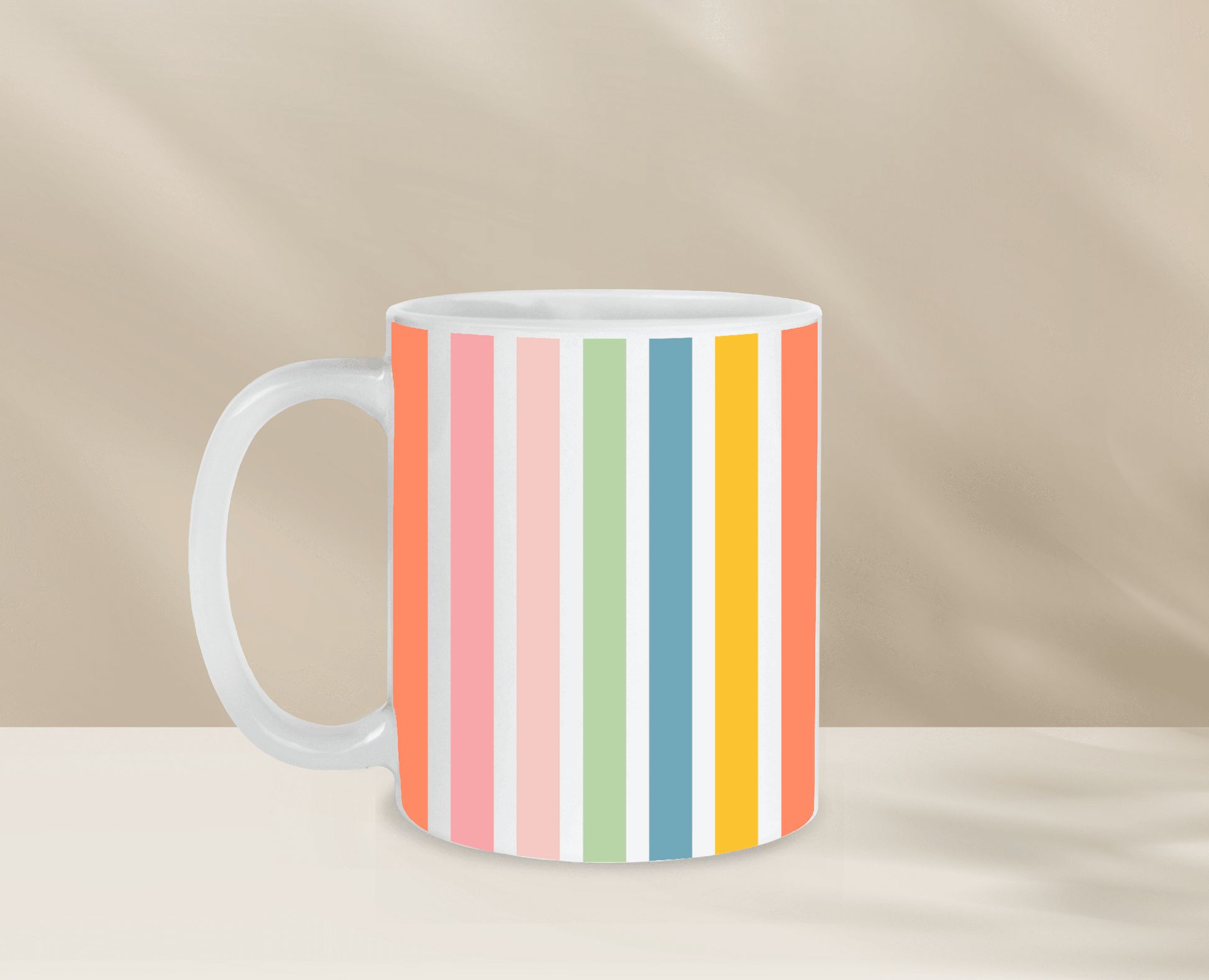 Colorful striped coffee mug on neutral background.