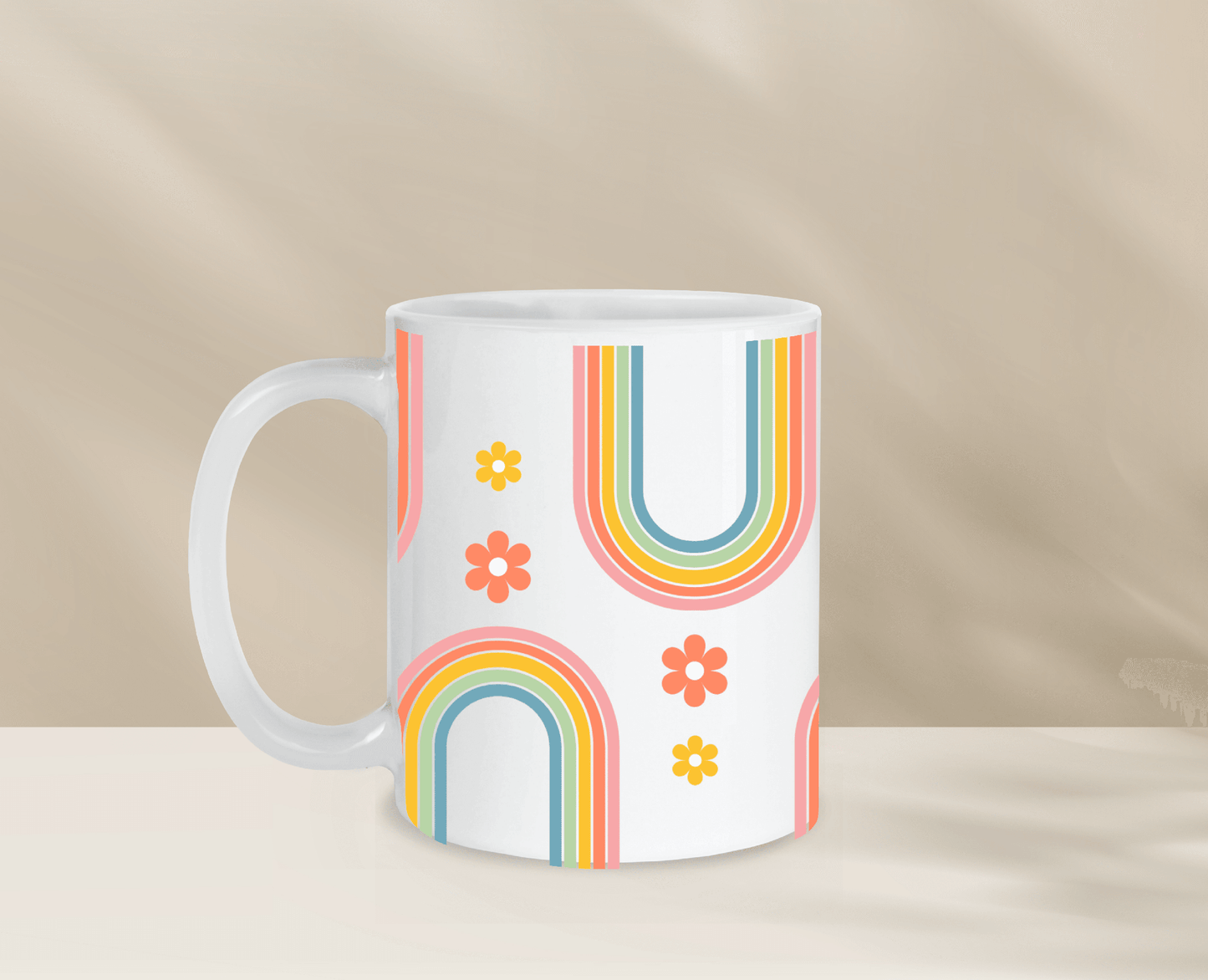 Colorful coffee mug with unique rainbow and flower design, perfect for morning coffee.